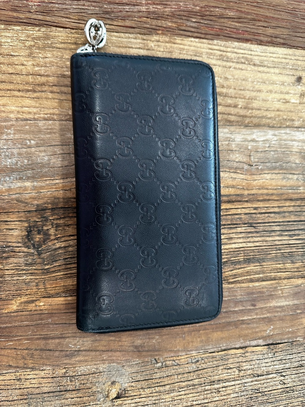 Gucci Black Embossed GG Zip Wallet with Silver Hardware